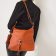 sac à main rouge orange mode femme automne hiver 2024 vue 6